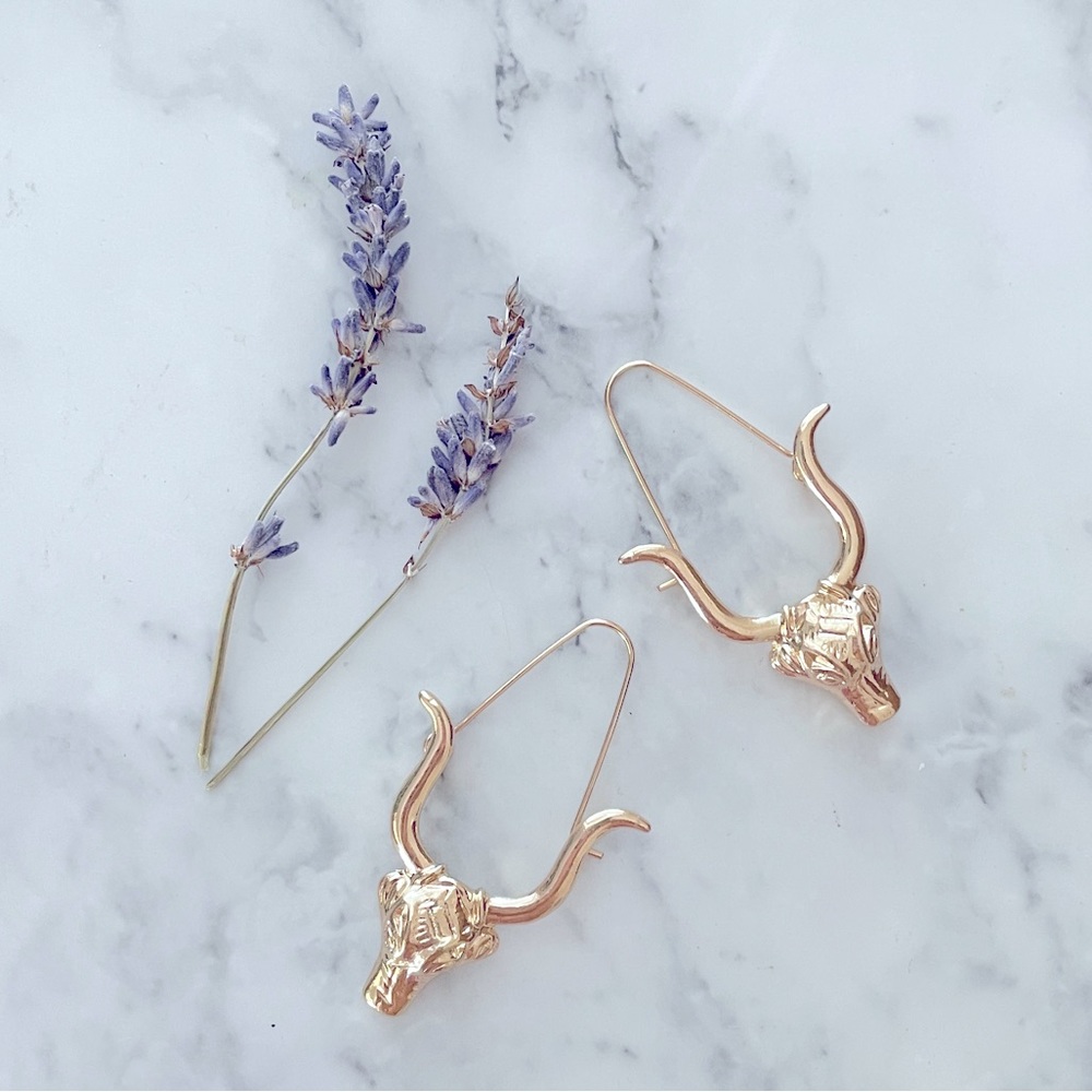 Gold bull fashion earrings